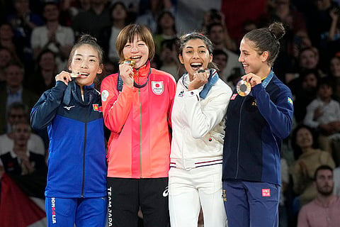 Medal ceremony for women's -48kg event in team judo competition